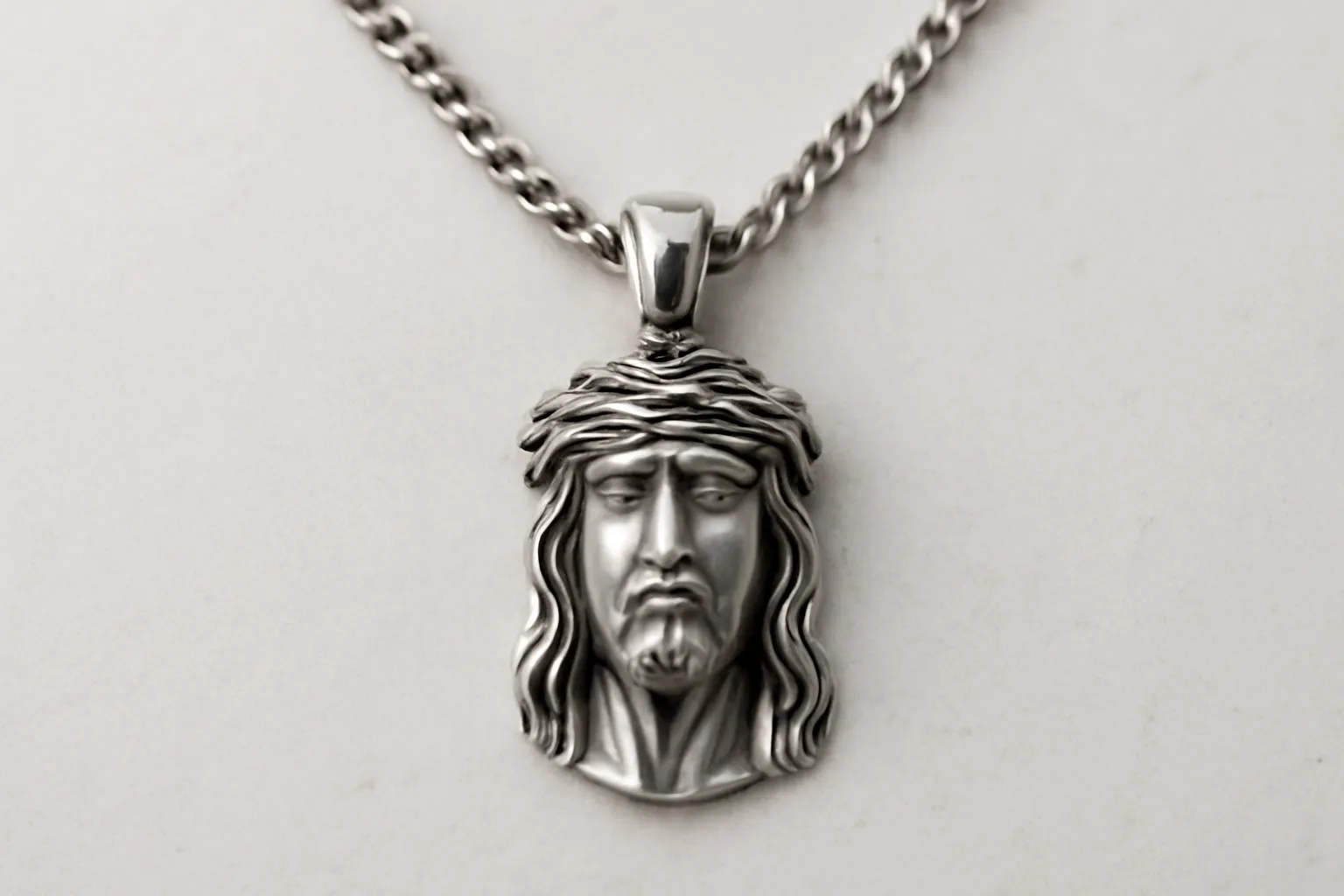 silver jesus piece pendant